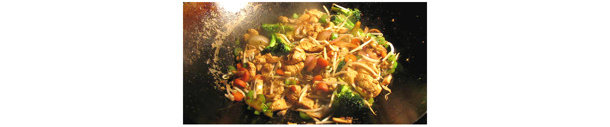 stir fry in 16 inch wok in a large Big Green EGG kamado grill