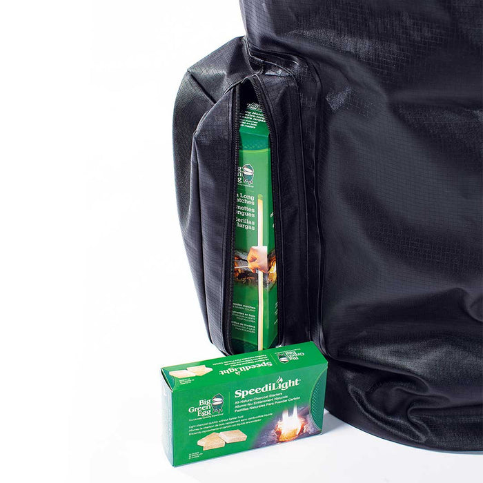 Side view of the zipper lined, fire starter pouch on the Big Green EGG Charcoal Storage Bag, 128201