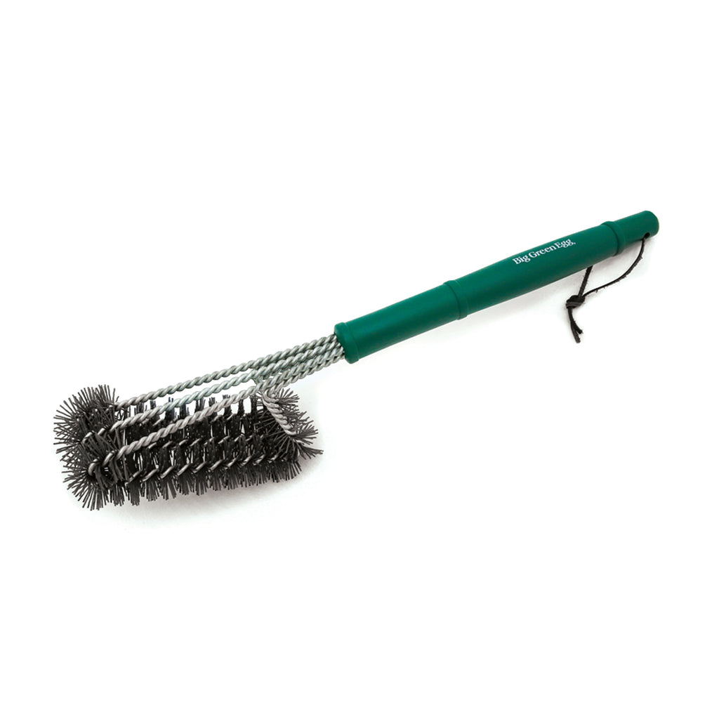 Side angle view of the Big Green EGG Diamond-Coated Nylon Bristle Grid Brush with long 18" handle.