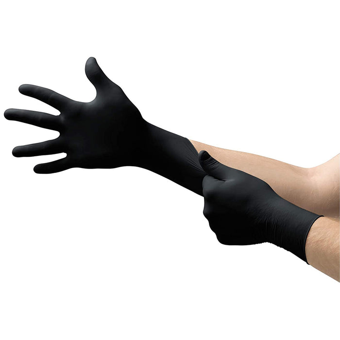 Microflex Onyx black nitrile gloves shown on both hands. Great fit to hands. Black preferred nitrile glove color for grilling or barbeque.