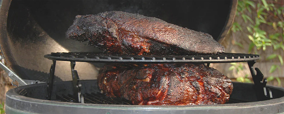 XL Big Green EGG smoking a brisket and two pork butts using Ceramic Grill Store's XL Adjustable Rig.
