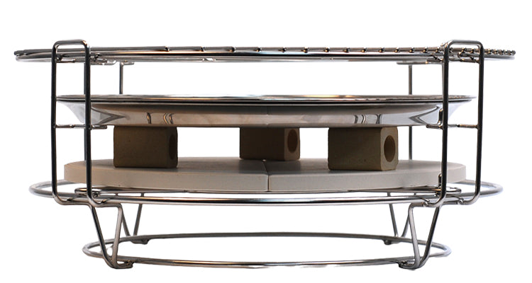 2-Inch Ceramic Spacers set on their side to create an air gap between heat deflectors and drip pan in a Kamado Joe Divide & Counquer.