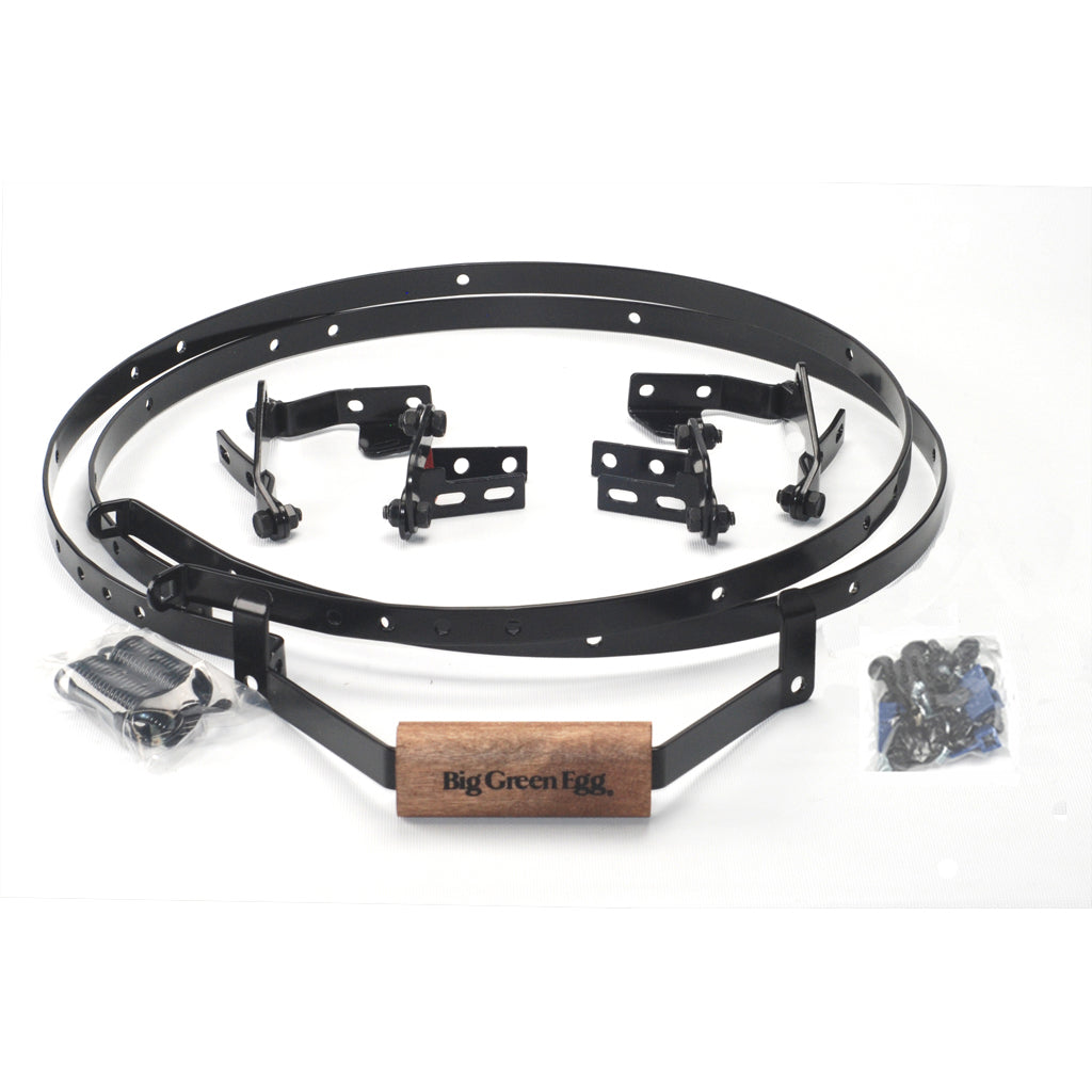 All the OEM parts to a Medium, MiniMax, Small and Mini Big Green EGG Band and Hinge Kit are displayed. For each grill, the kit incudes: two bands, four hinges, two springs, handle, hardware pack for each.