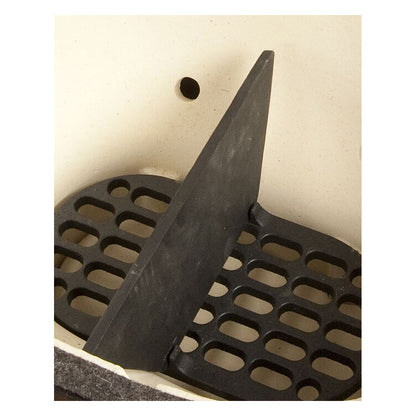 Top down view of the Primo Grills cast iron firebox divider plate set up in Primo XL Oval Grill. Divider plate is resting on the slots on the charcoal plate and equally divides the firebox.