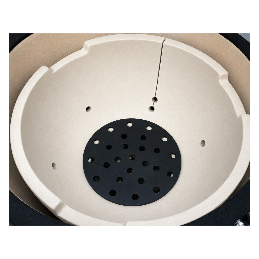 Top-down view of a Primo Kamado Round ceramic firebox installed inside the grill (charcoal grate not included).