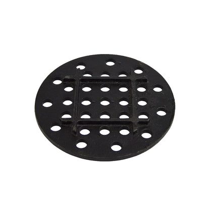 Bottom side of the primo round charcoal grate, showing the reinforced thickness.
