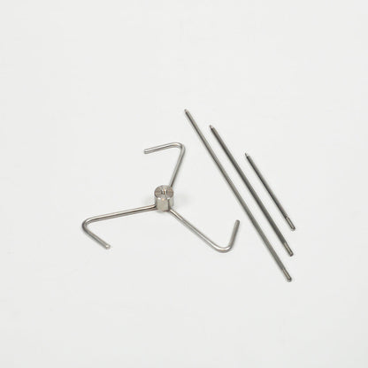 Top view of the vertical skewer parts: 3 leg base, threaded collar and 5", 9" and 12" vertical skewers.