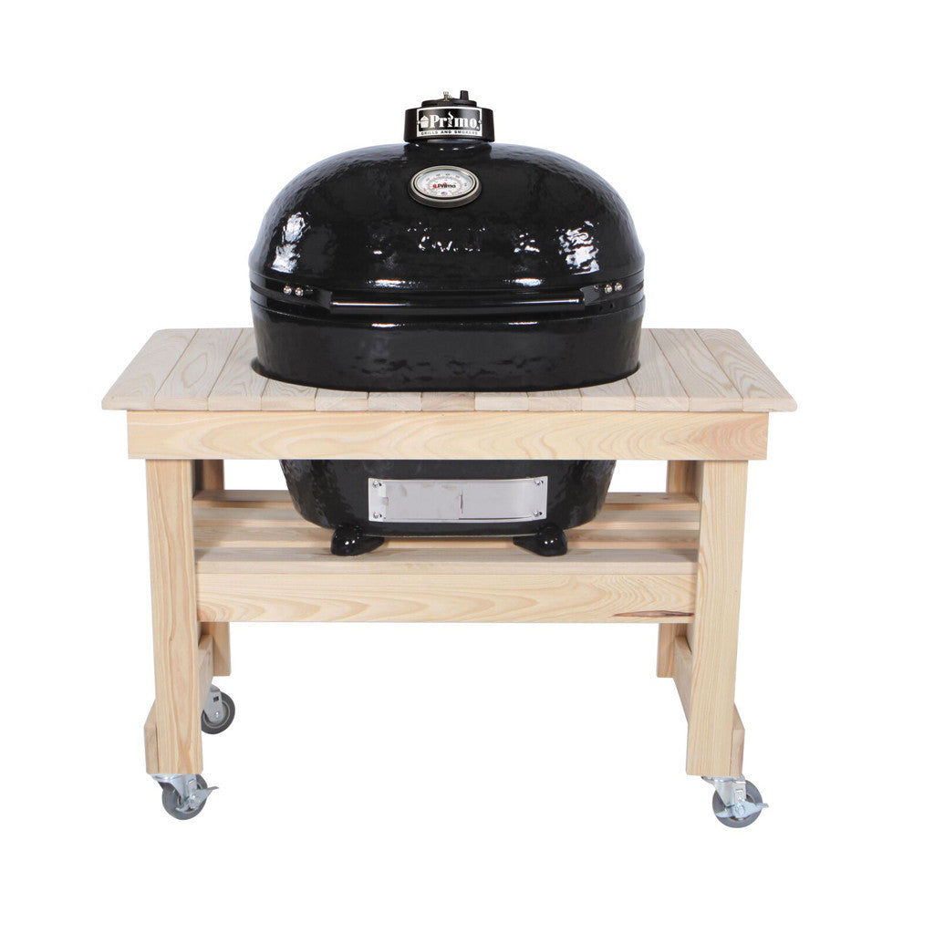 4 ceramic feet under a Primo Oval Grill sitting in a Primo Compact Cypress Table