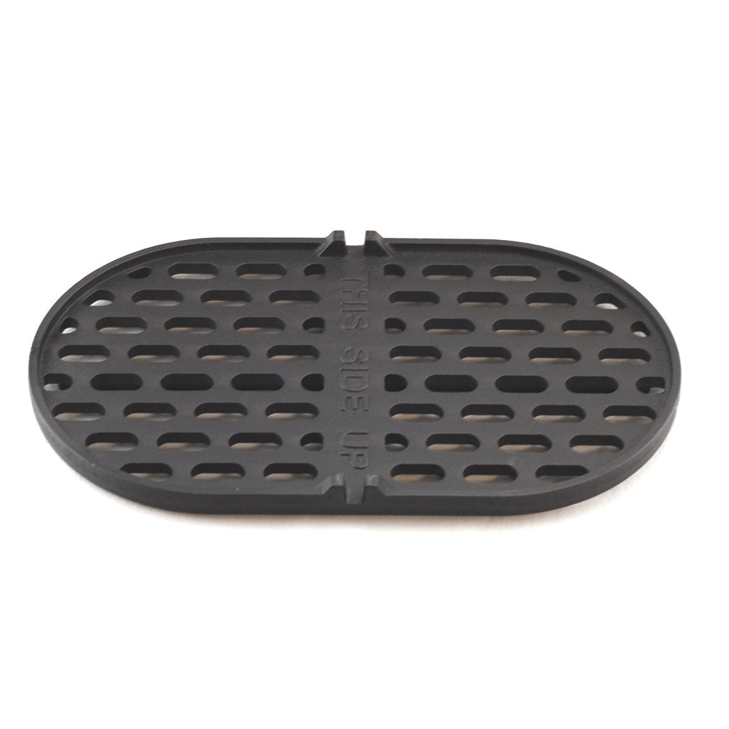 Top view of a replacement cast iron charcoal lump grate for primo oval grills