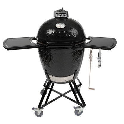 Front view of the Primo Round Kamado Grill, cradle and folding side shelves.