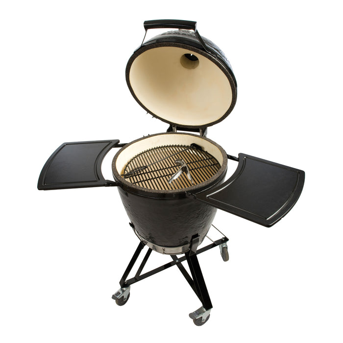 Primo Grill's Round Charcoal Kamado with dome open and in Primo Grill Stand and Side Shelves.